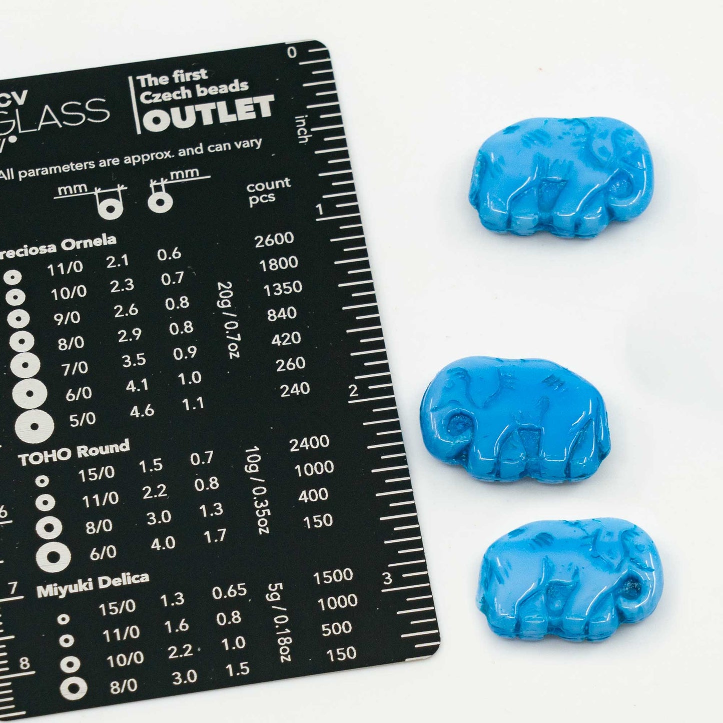 OUTLET 10 grams Pressed Beads Elephants, 16 x 23 mm, Opal Blue Dristex Blue Lined (32010-D0Z11), Glass, Czech Republic
