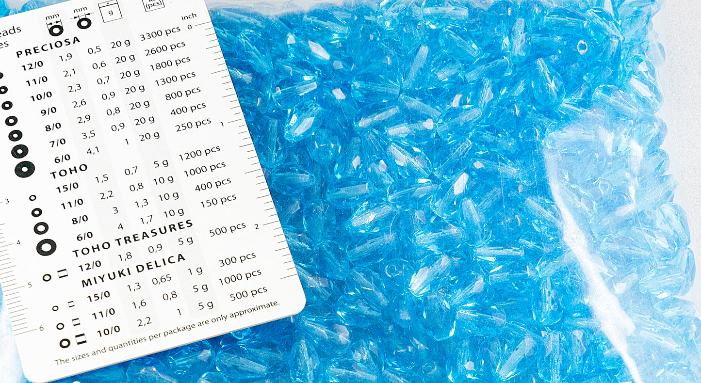 OUTLET 250g Faceted Teardrop Beads pear, 10 x 7 mm, Transparent Aqua (60020), Glass, Czech Republic