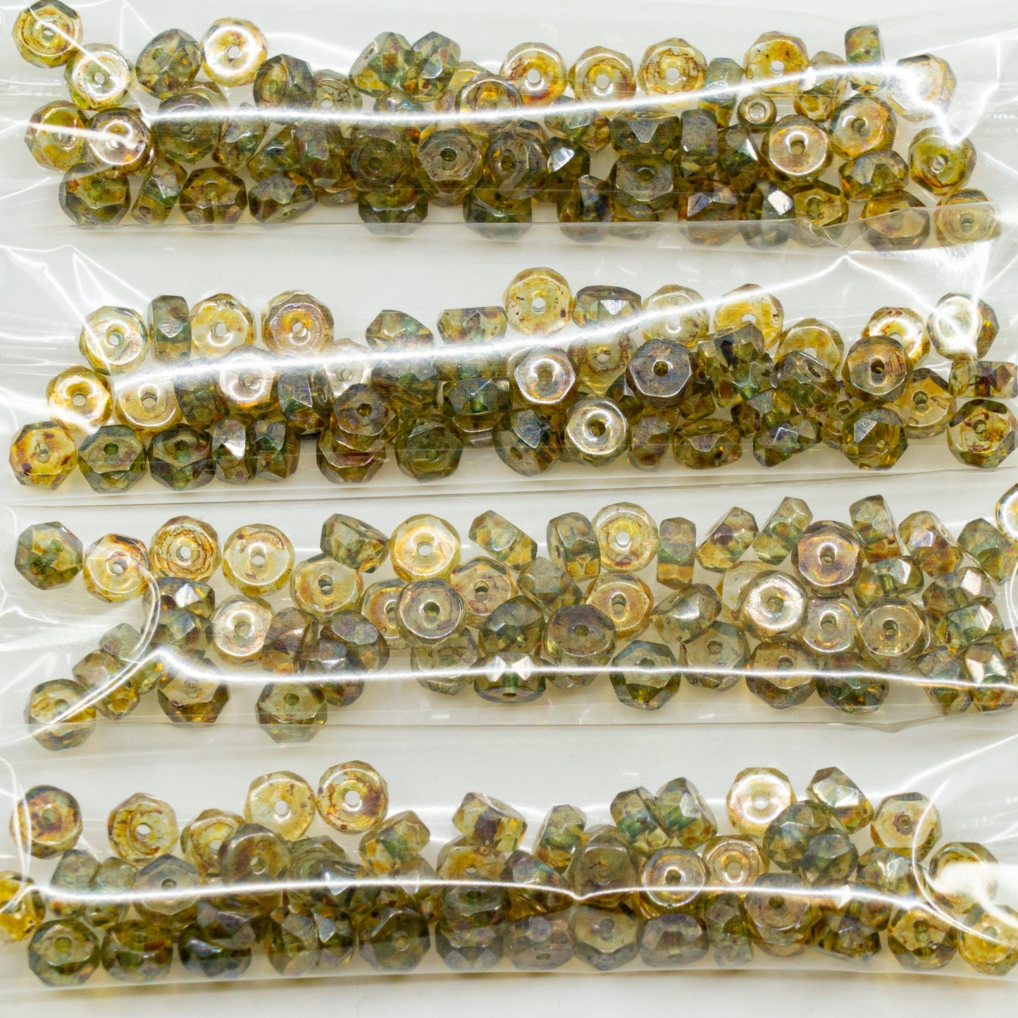 OUTLET 10 grams Rondelle Faceted Beads, 3 x 6 mm, Crystal Stain With Luster Green (00030-65455), Glass, Czech Republic