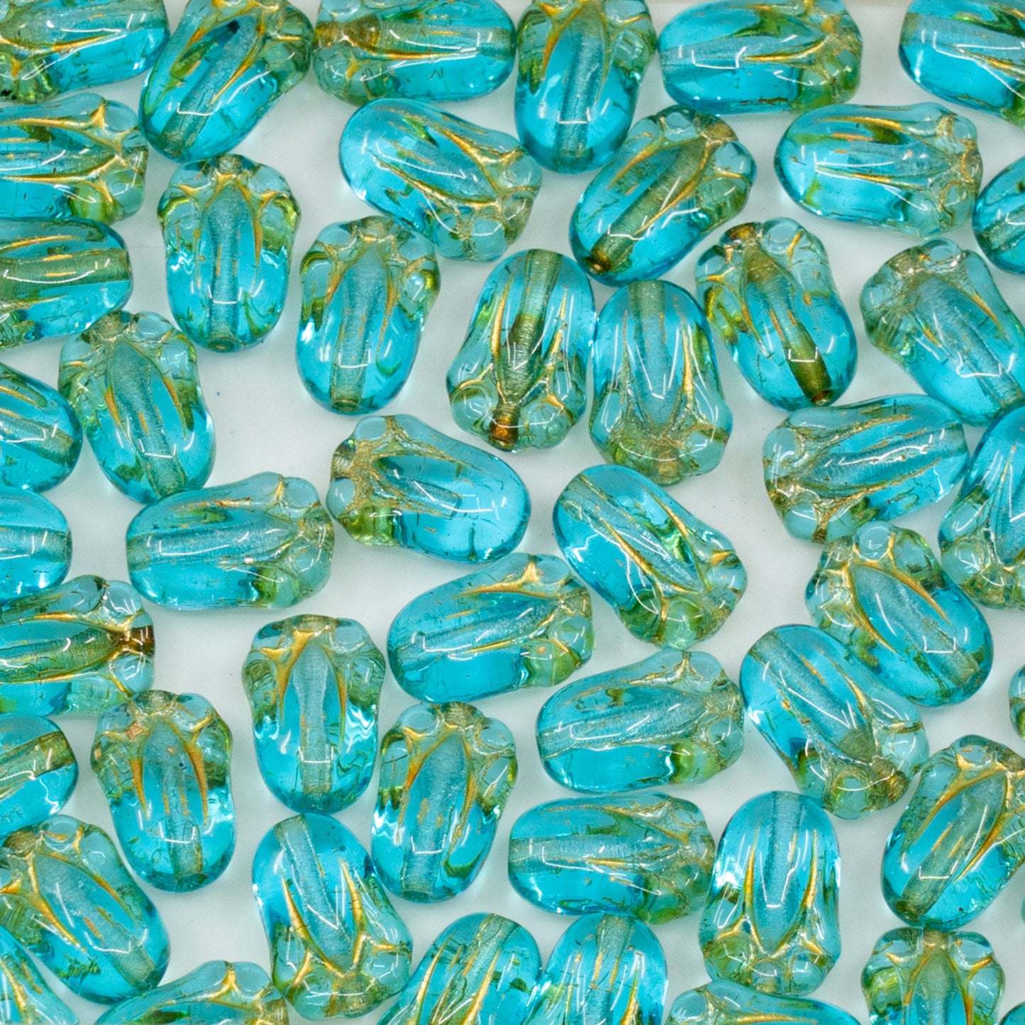 OUTLET 250g/50g Tulip Bud Beads, 10 x 7 mm, Transparent Aqua Gold Lined (60020-54302), Glass, Czech Republic
