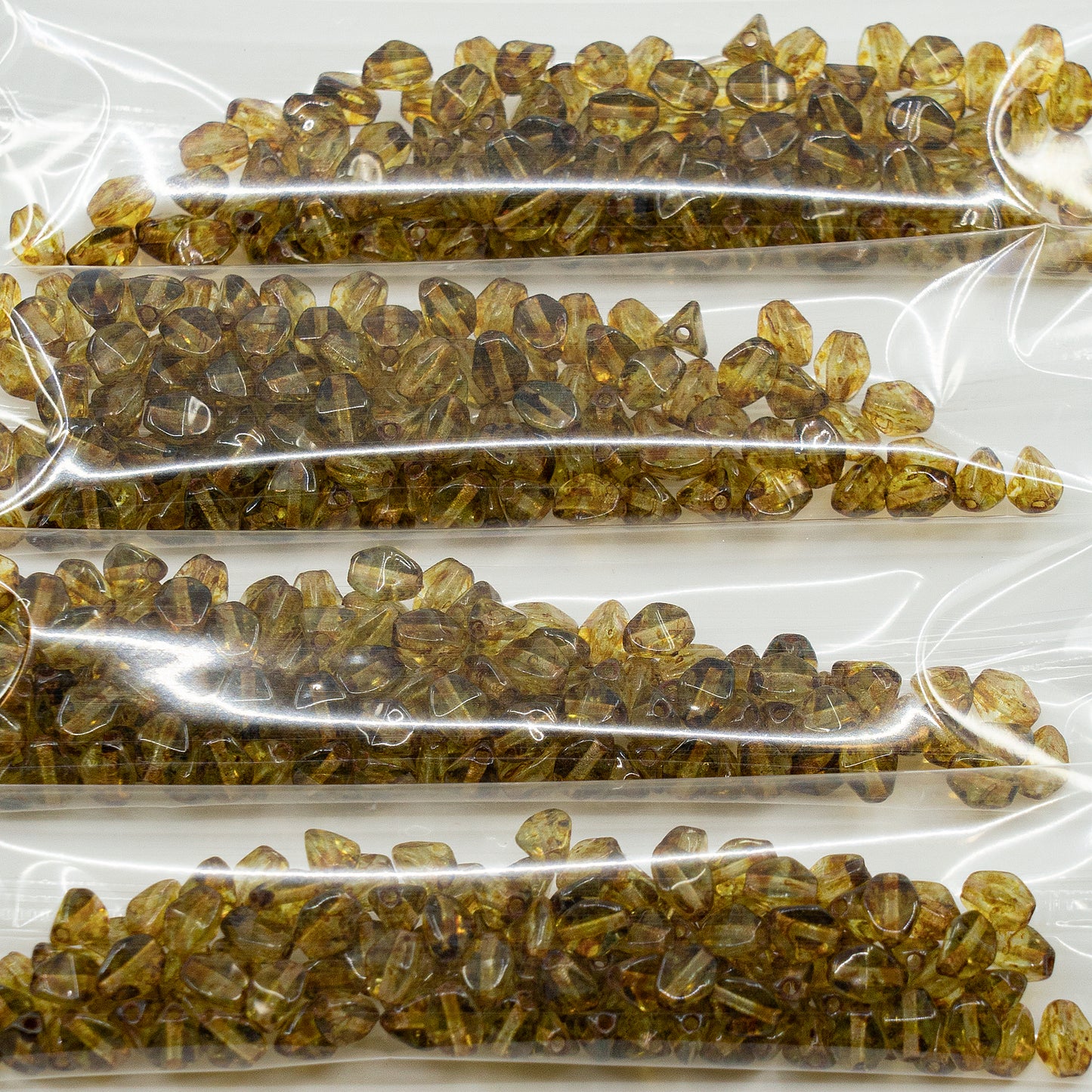 OUTLET 10 grams Pinch Beads, 5 x 5 mm, Transparent Green Travertin (50500-86800), Glass, Czech Republic
