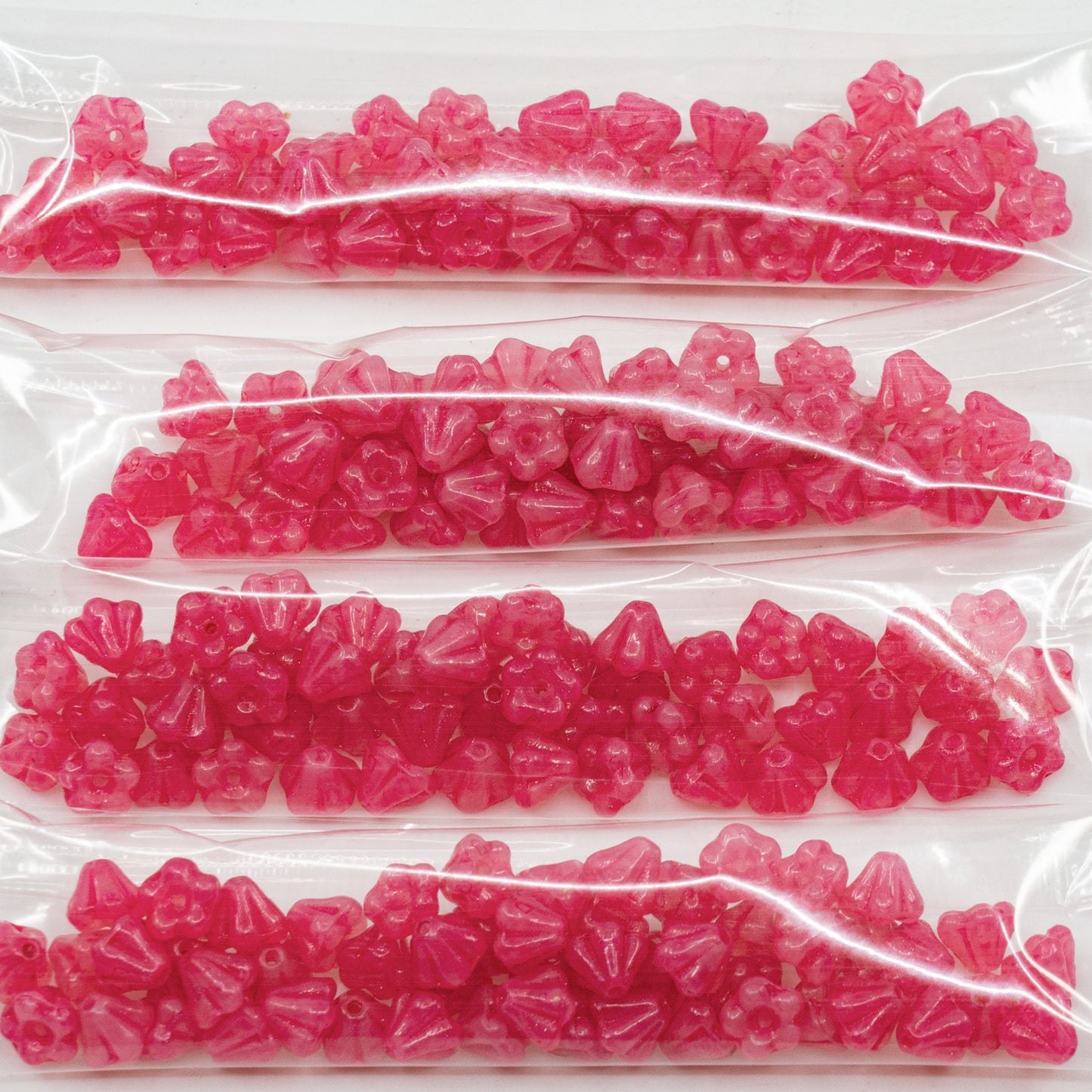 OUTLET 10 grams Bell Flower Beads, 4 x 6 mm, Opal Pink Dristex Intense Pink (71000-D0108), Glass, Czech Republic