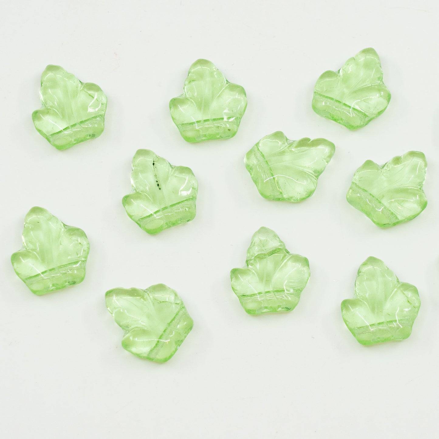 OUTLET 10 grams Grape Leaf Beads (Upper Hole), 14 x 16 mm, Transparent Green (50500), Glass, Czech Republic