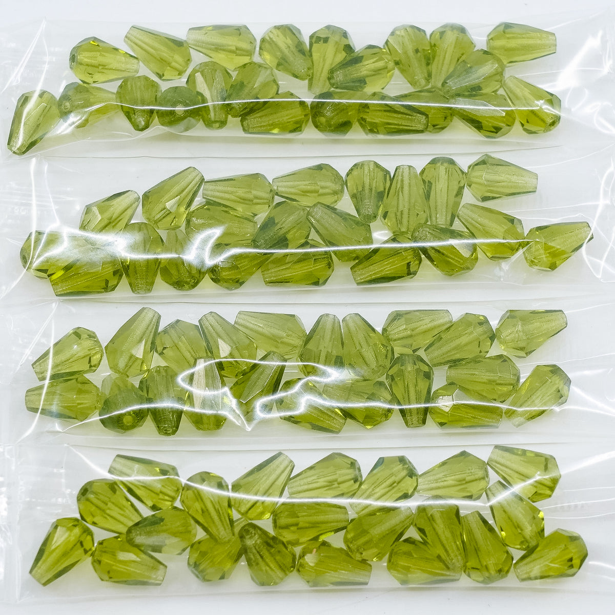 OUTLET 10 grams Pear Teardrop Beads Faceted Fire Polished, 10 x 7 mm, Transparent Green (50220), Glass, Czech Republic