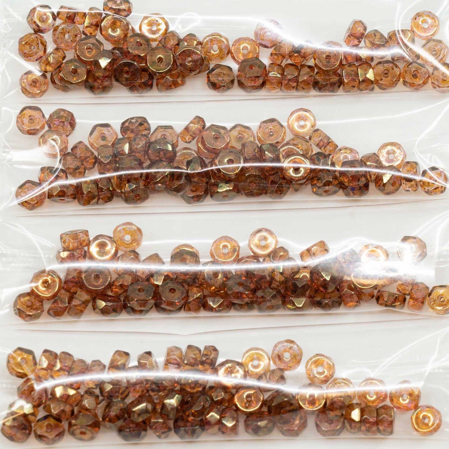 OUTLET 10 grams Flower Beads, 3 x 6 mm, Crystal Stain With Luster Red (00030-65491), Glass, Czech Republic