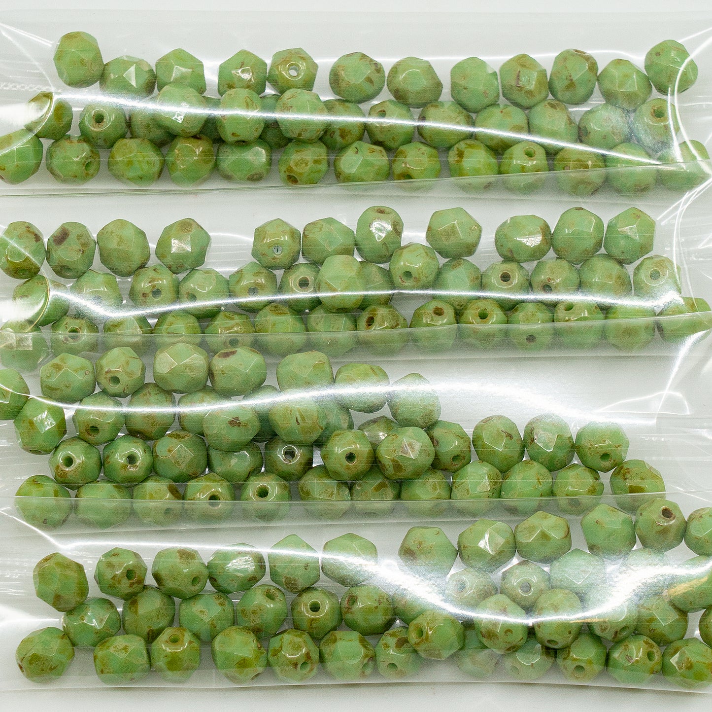 OUTLET 10 grams Faceted Round Fire Polished Beads, 6 x 6 mm, Opaque Green Travertin (53200-86800), Glass, Czech Republic