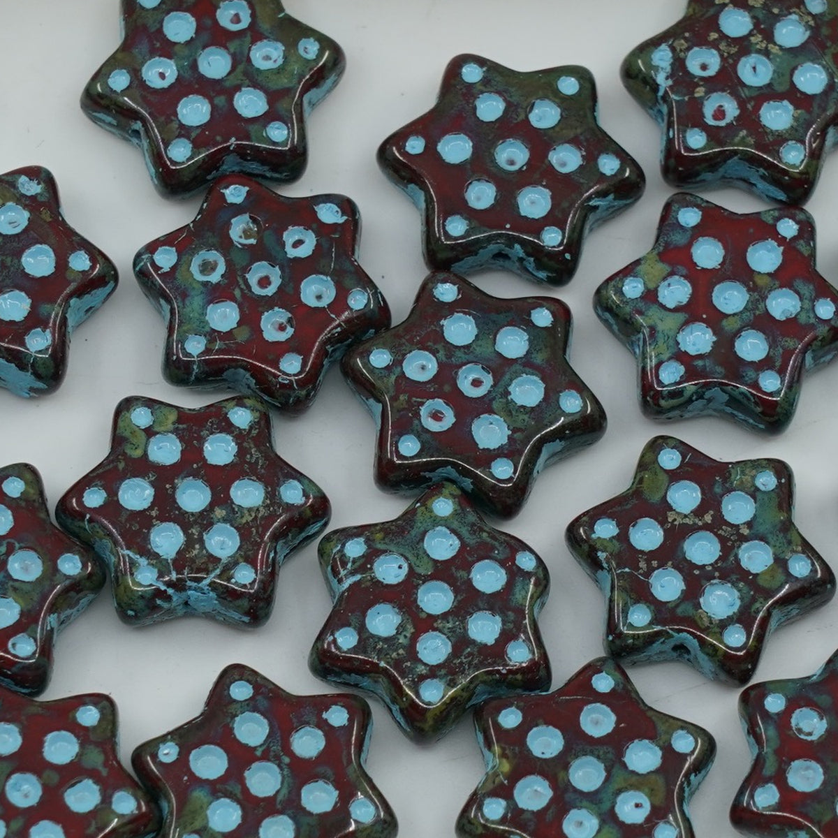 OUTLET 250g/50g Pressed Beads Star With Dot, 16 x 16 mm, Opaque Red Travertin Light Blue Lined (93200-86800-54308), Glass, Czech Republic