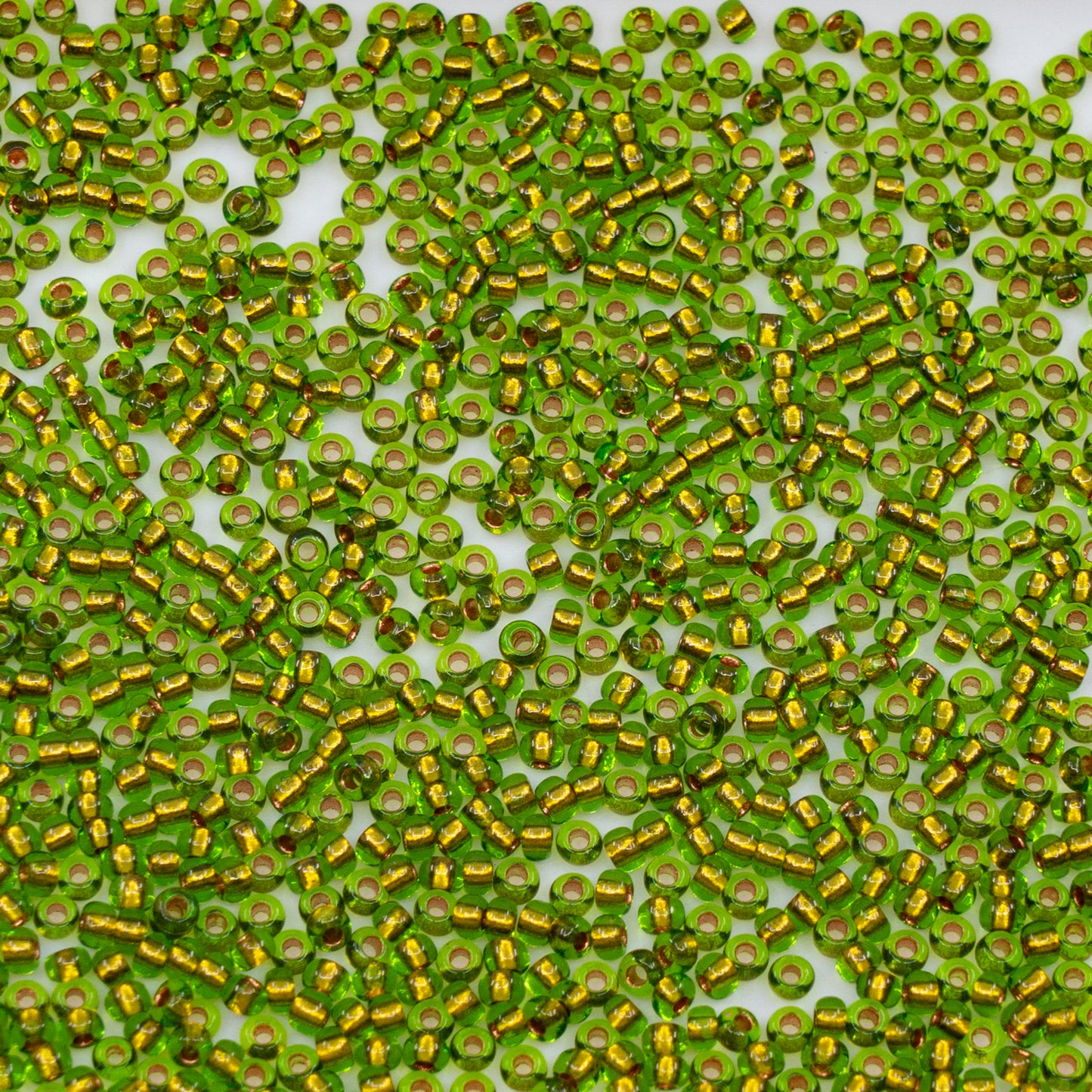OUTLET 10 grams Preciosa Ornela Seed Beads, Round Hole, Loose, 11/0, transp. green, copper lined (59430), Glass, Czech Republic