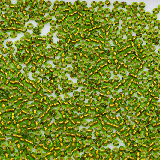 OUTLET 10 grams Preciosa Ornela Seed Beads, Round Hole, Loose, 11/0, transp. green, copper lined (59430), Glass, Czech Republic