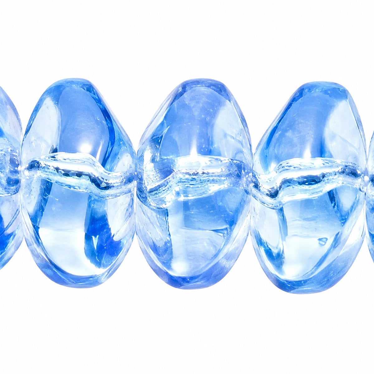 Pressed Rondelle Beads, Transparent Blue (30010), Glass, Czech Republic