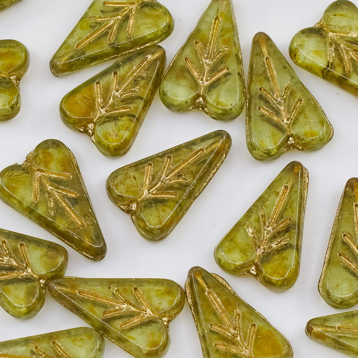 OUTLET  grams Heart Leaf Bead, 16 x 11 mm, Transparent Green Travertin Gold Lined (50400-86800-54302), Glass, Czech Republic