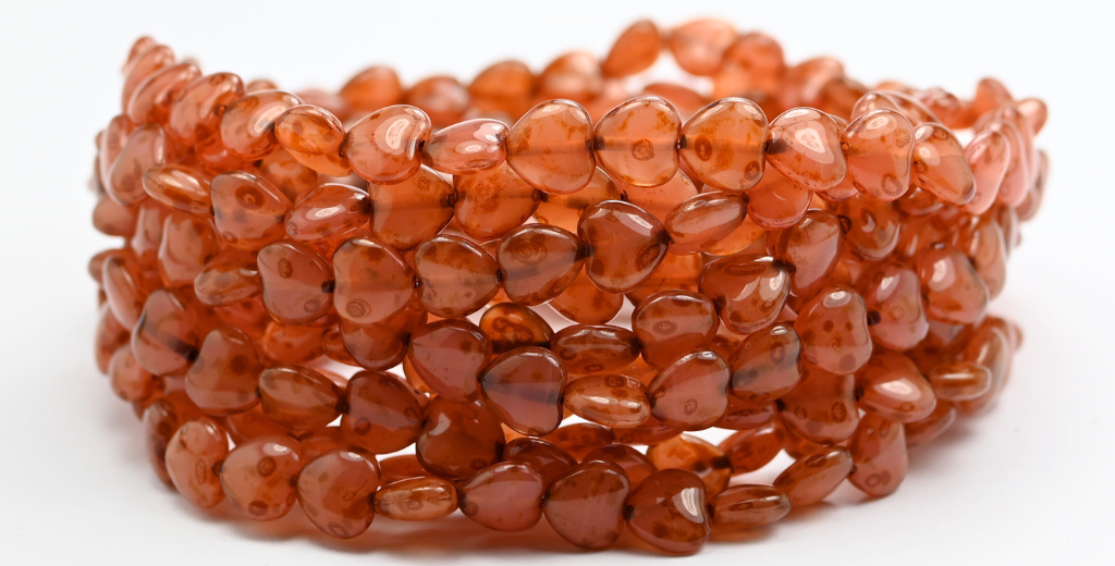 ハート型押しガラスビーズ、オパールピンクトラバーチン（71010-86800）、ガラス、チェコ共和国～STRANDED