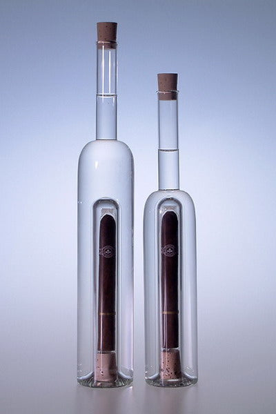 Elongated empty bottle with room for cigar, Glass, Czech Republic